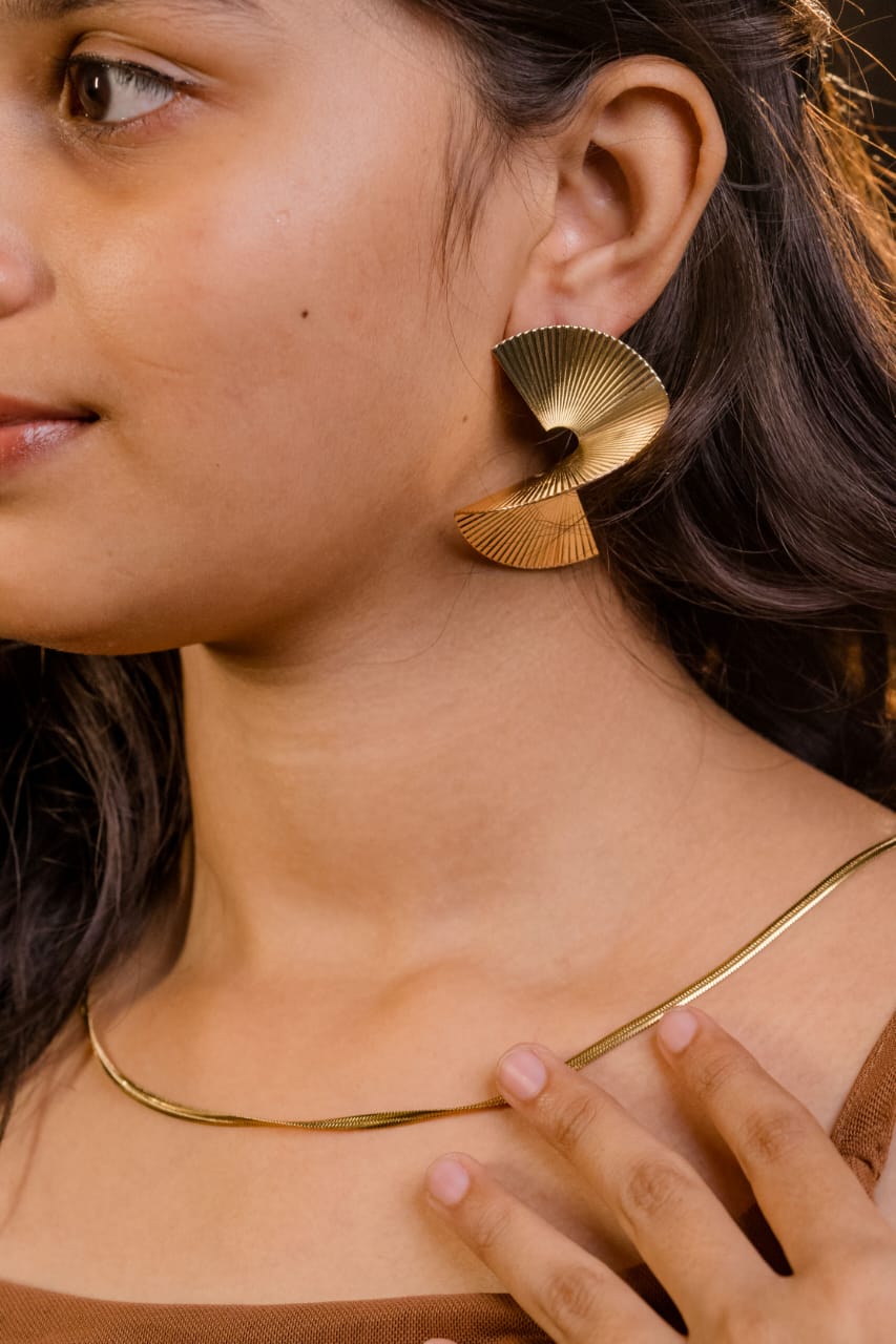 Gold plated statement fan earrings