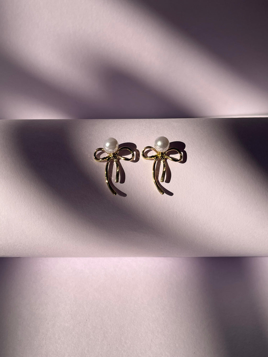 Pearl bow earrings